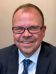 Headshot of Justin Ashley