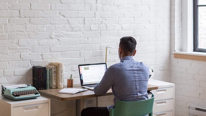 person looking at computer