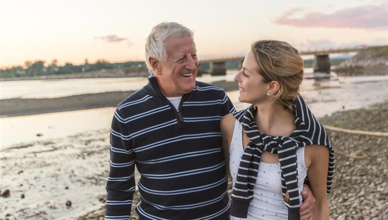 two people smiling at each other