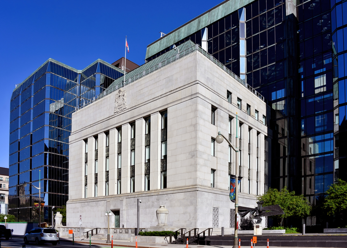 Ottawa, Canada - June 15, 2024: The Bank of Canada Building on Wellington Street. The Bank of Canada is a Crown Corporation and Canadas central bank and is responsible for formulating Canada's monetary policy and setting the interest rate on borrowed money.