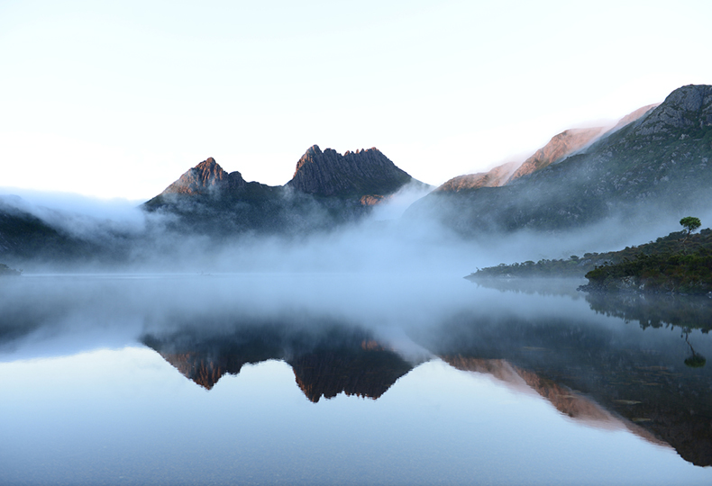 The reflex of Cradle Mountain on the surface of Dove lake during morning at Cradle Mountain-Lake Saint Clair National Park, Tasmania, Australia