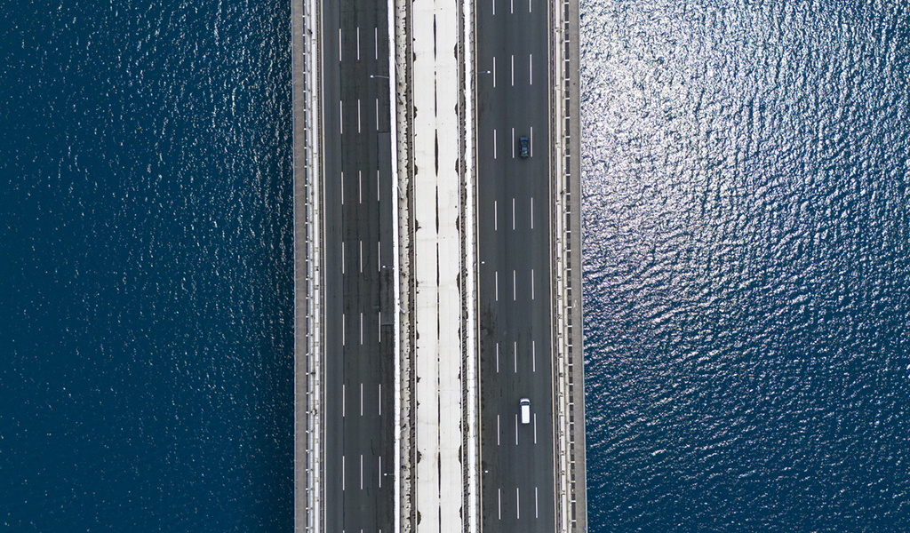 Aerial top view of Istanbul Bosphorus and Bridge in Istanbul. Traffic on Bridge in Istanbul.